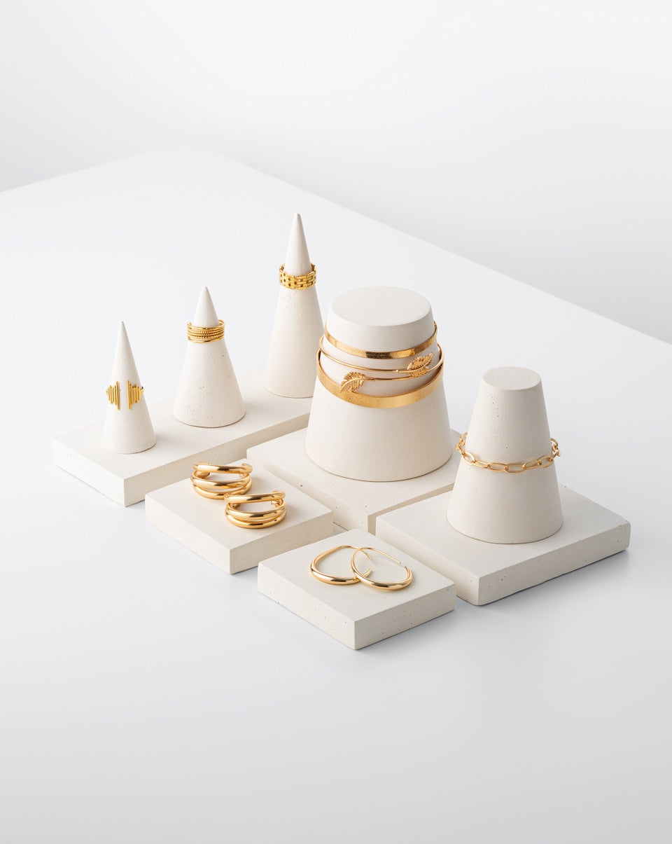 Concrete jewelry display stands