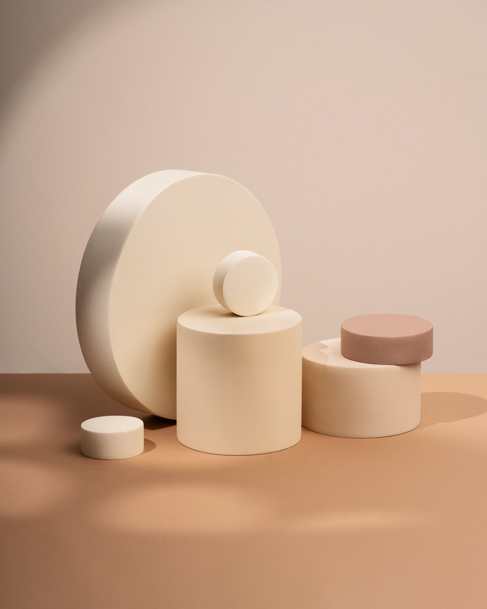 Sculptural mineral display objects arranged for a boutique or showroom interior