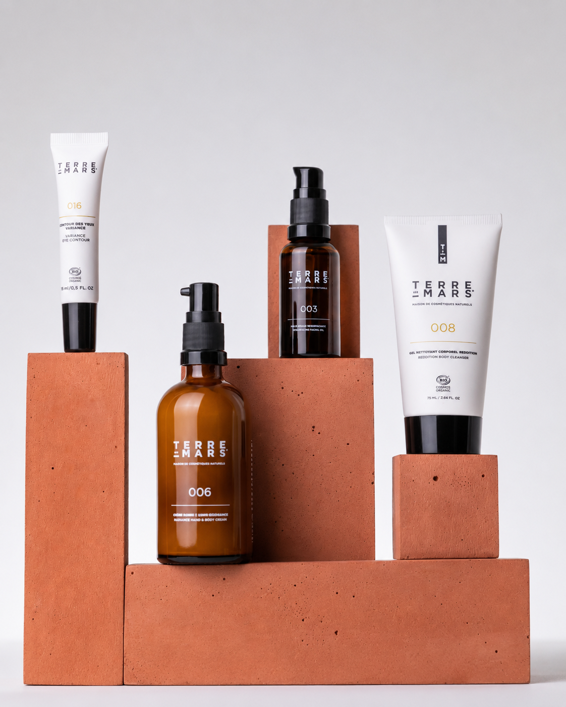 Skincare campaign arranged on modular terracotta Betonvton product photography blocks