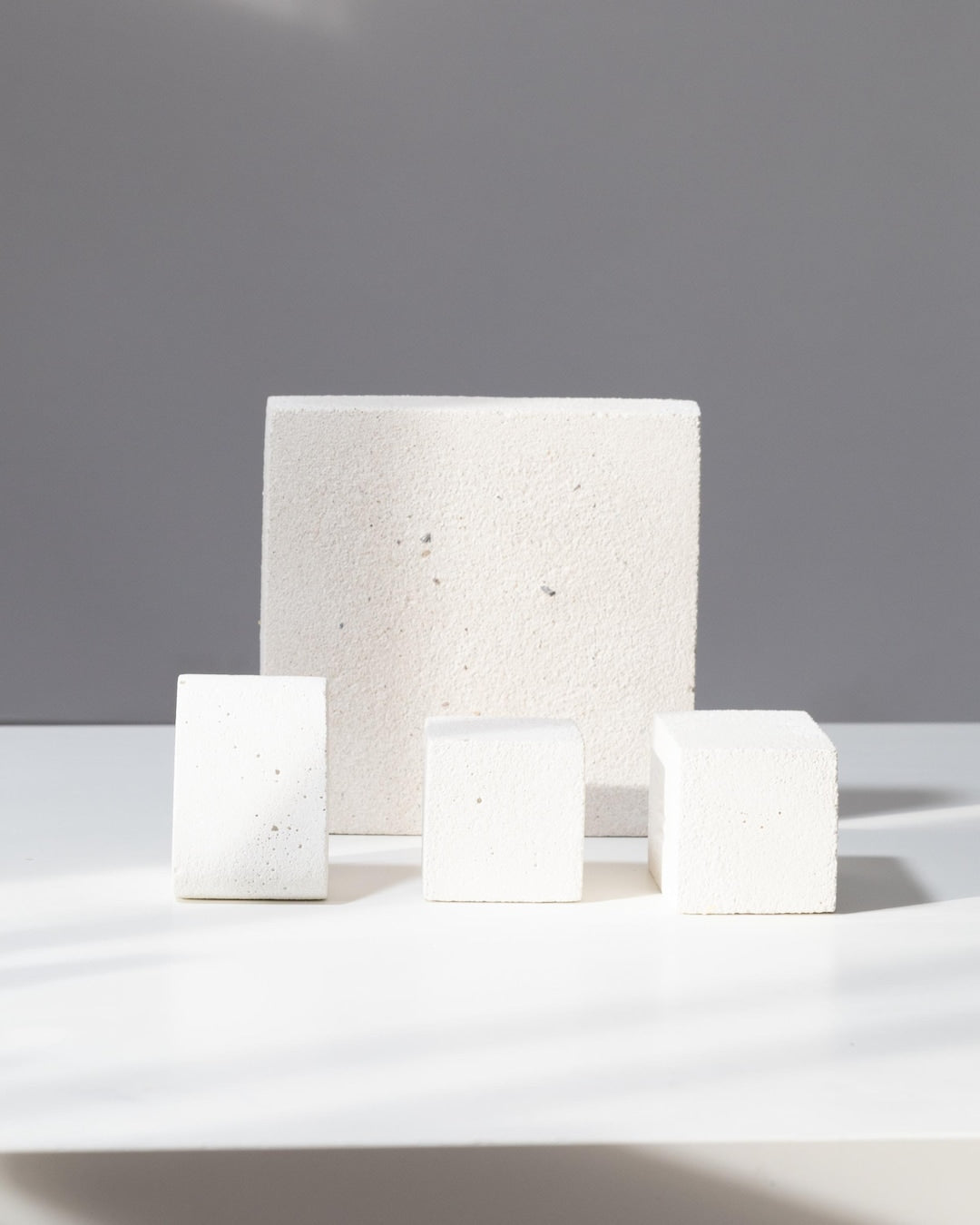 Textured off white jewelry display blocks styled together