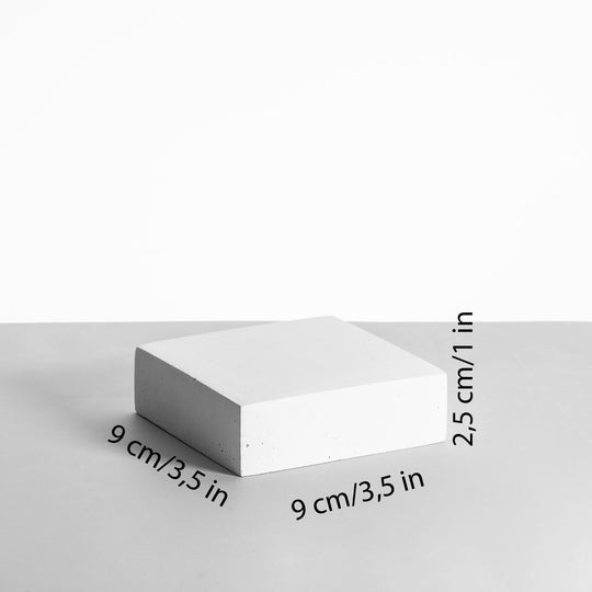 Square white display tile approx. 9 x 9 x 1 cm with matte finish