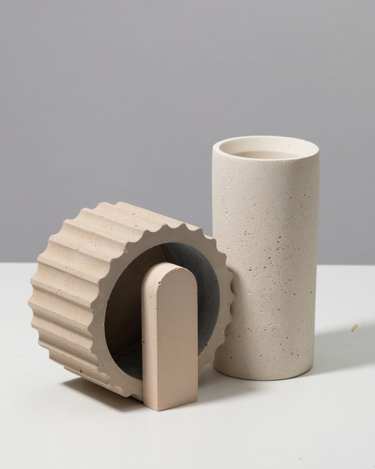 Beige plaster display risers styled for skincare and beauty products
