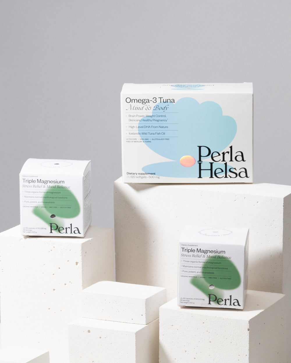 Supplement packaging styled on white display blocks