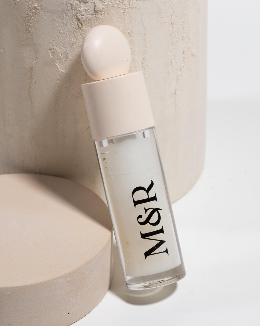 Beige display pedestal set from above
