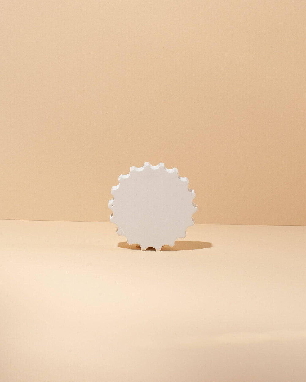 Gear shape prop used as a jewelry display for rings on a boutique counter